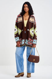 Cardigan fantasia e bottoni