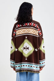 Cardigan fantasia e bottoni