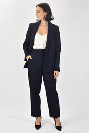 Pantalone sigaretta con piega