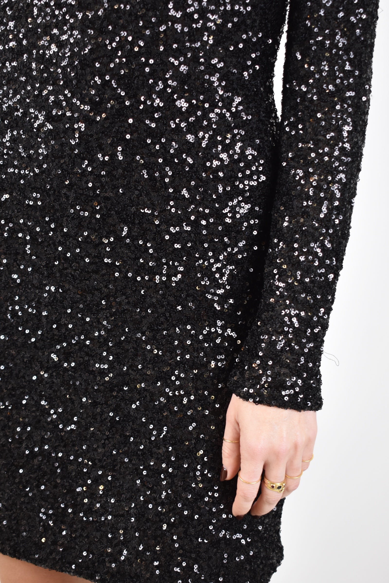 Abito paillettes oblò schiena