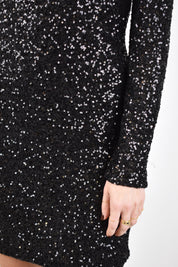 Abito paillettes oblò schiena