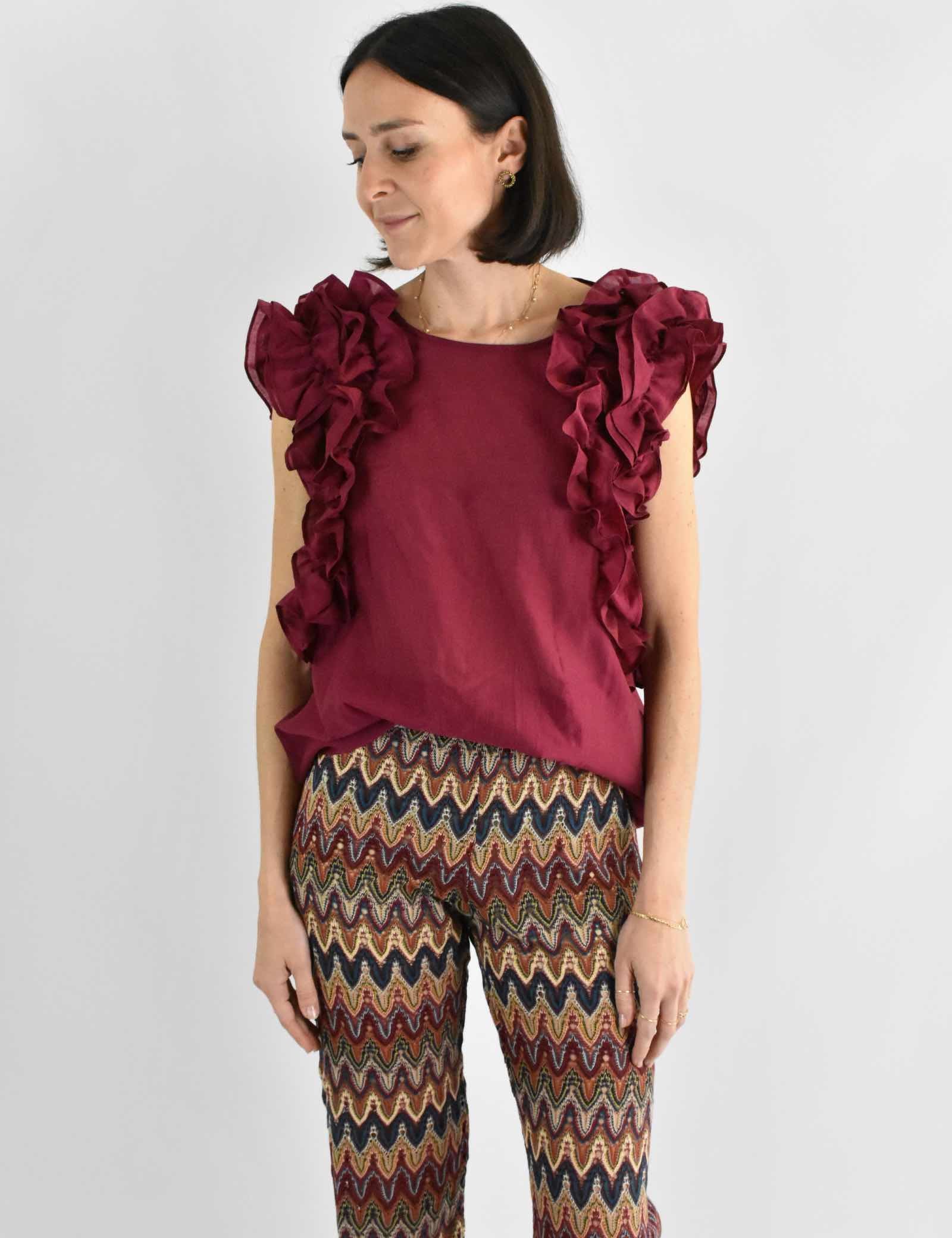 Blusa smanicata con rouges