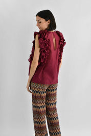 Blusa smanicata con rouges