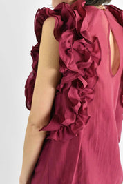 Blusa smanicata con rouges