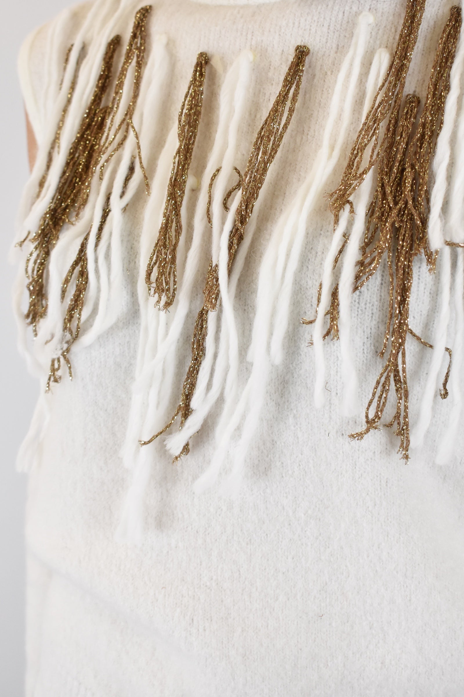 Lupetto ricamato + manicotti