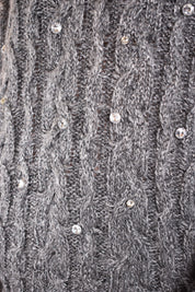 Maglia lurex e gioielli