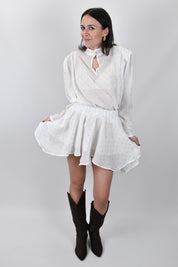 Blusa con spalline e lurex