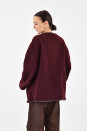 Cappottino riccio con alamari