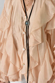 Camicia rouches e bolo