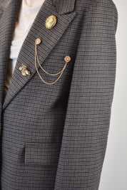 Giacca quadri e spille
