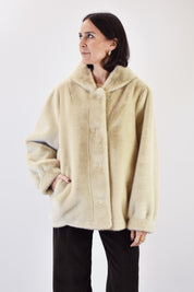 Ecopelliccia con cappuccio