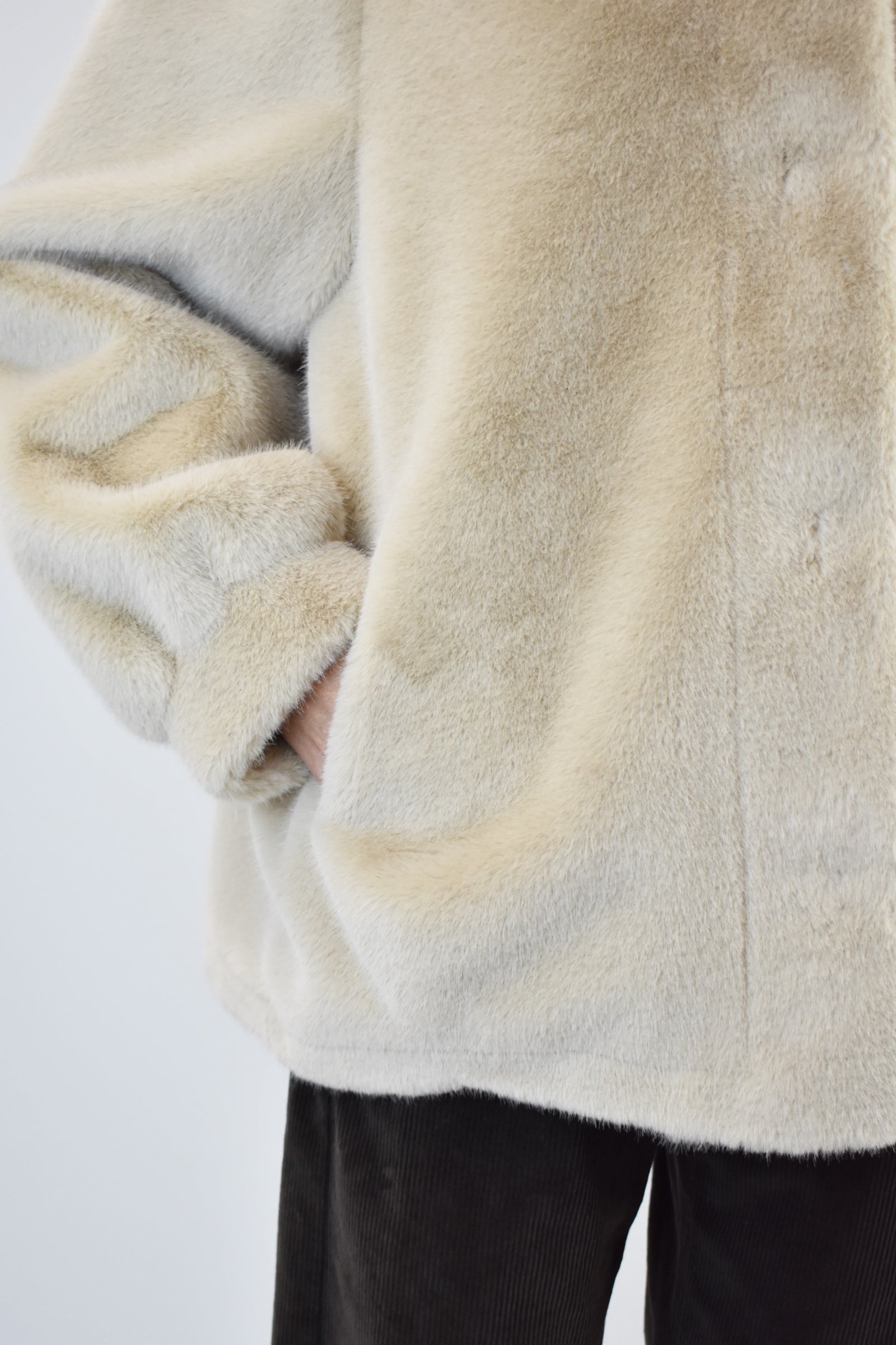 Ecopelliccia con cappuccio