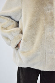 Ecopelliccia con cappuccio