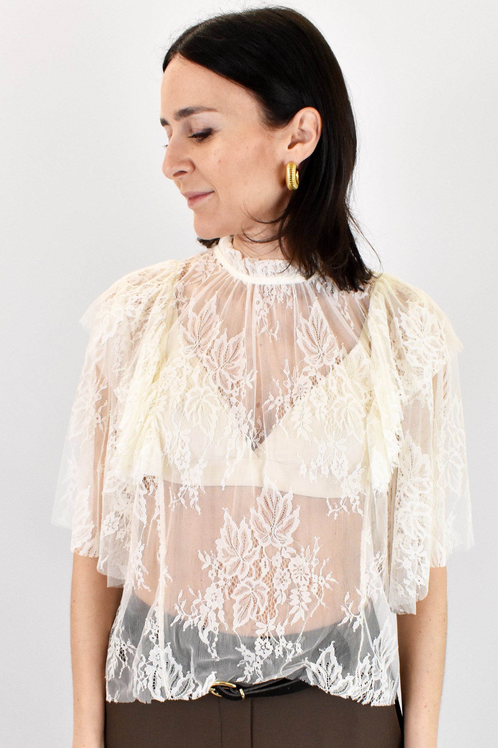 Blusa in pizzo con rouches