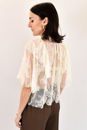 Blusa in pizzo con rouches