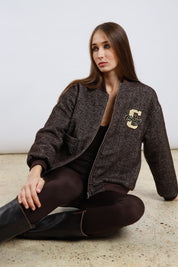 Bomber spinato e ecopelle