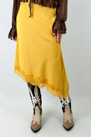 Top gonna asimmetrico pizzo