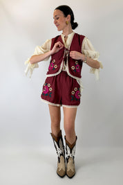 Shorts con fiori ricamati