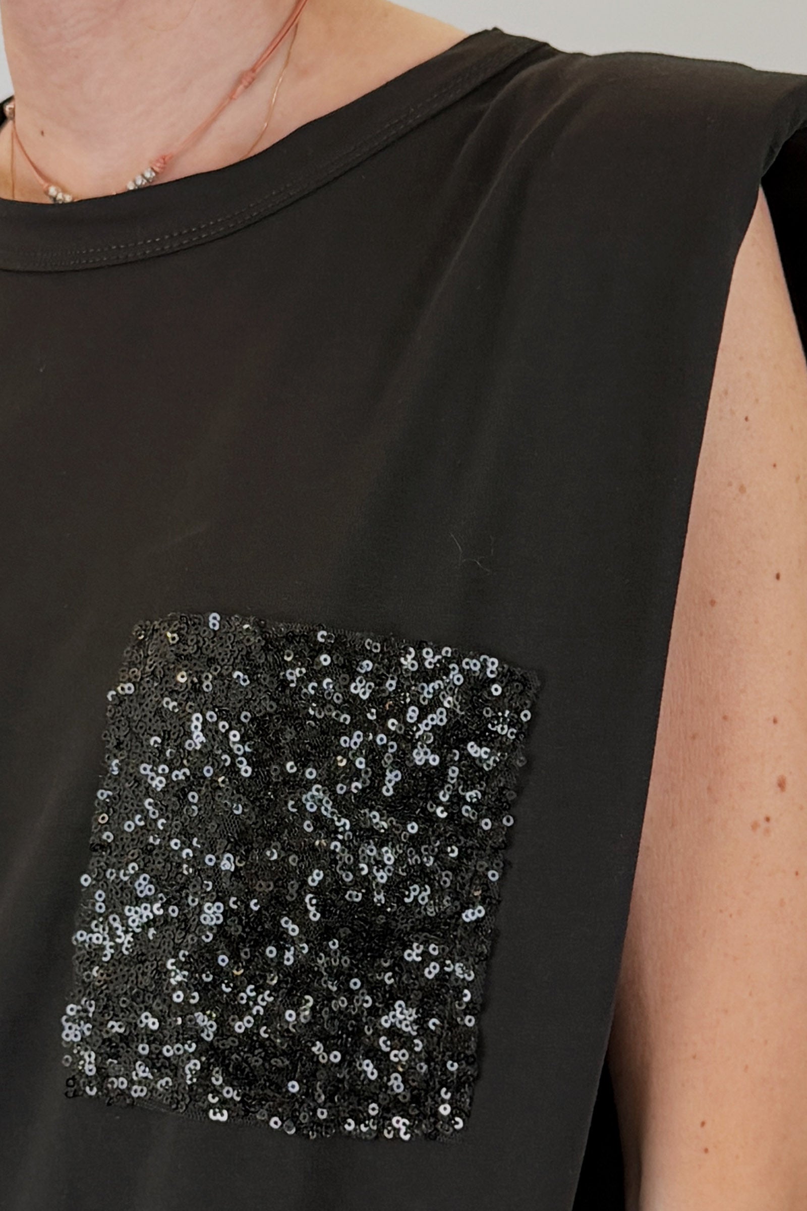 Abito con tasca paillettes