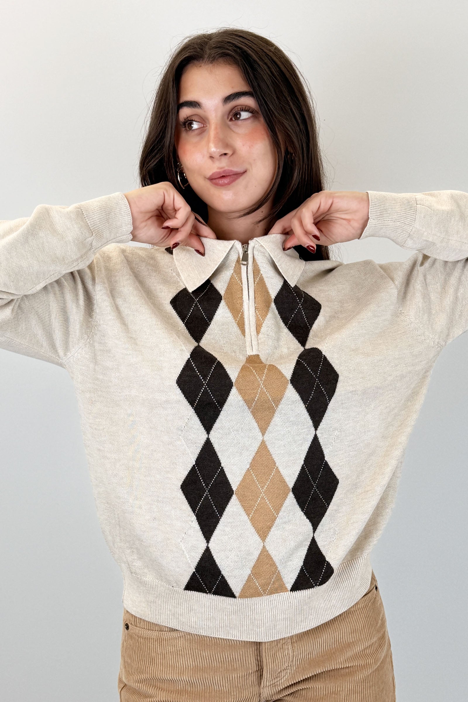 Polo a rombi con zip