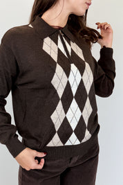 Polo a rombi con zip