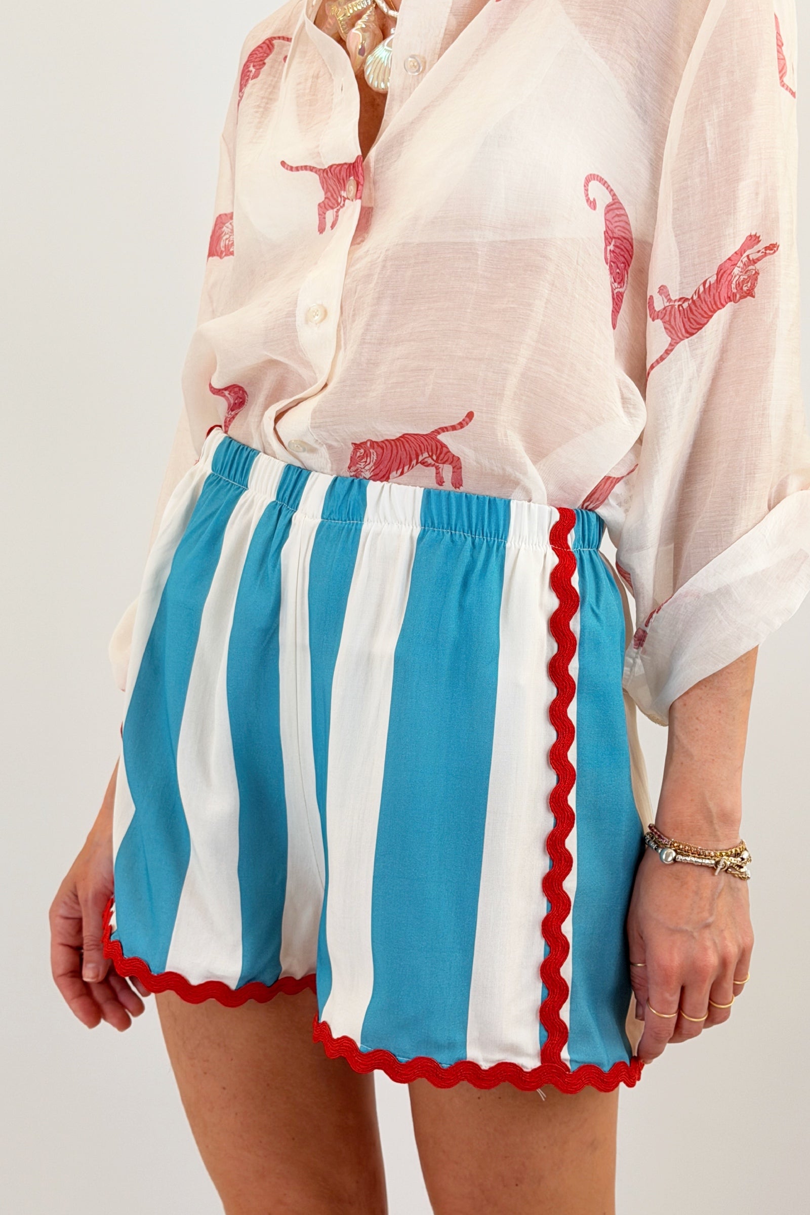 Shorts righe e passamaneria