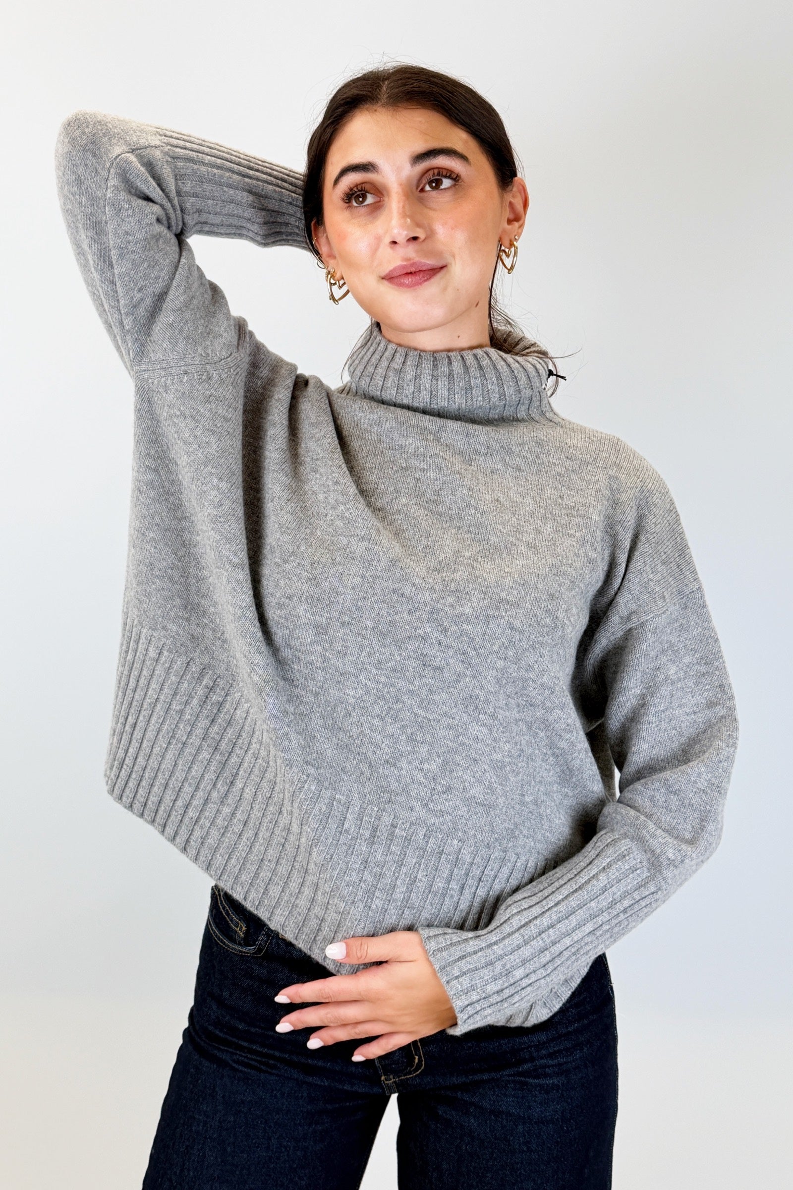 Maglia collo alto 100% lana