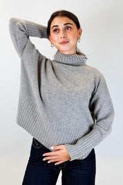 Maglia collo alto 100% lana