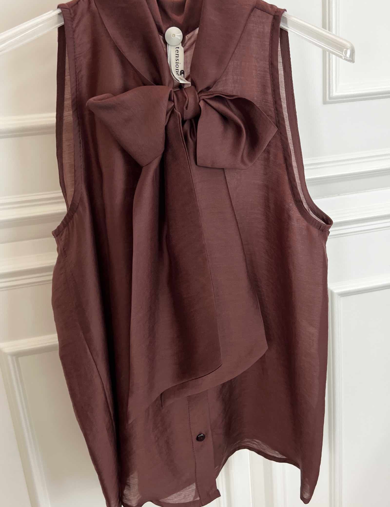Camicia fiocco smanicata