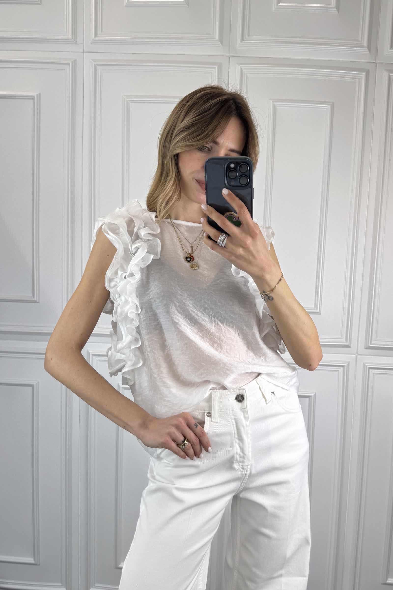 Blusa smanicata con rouges