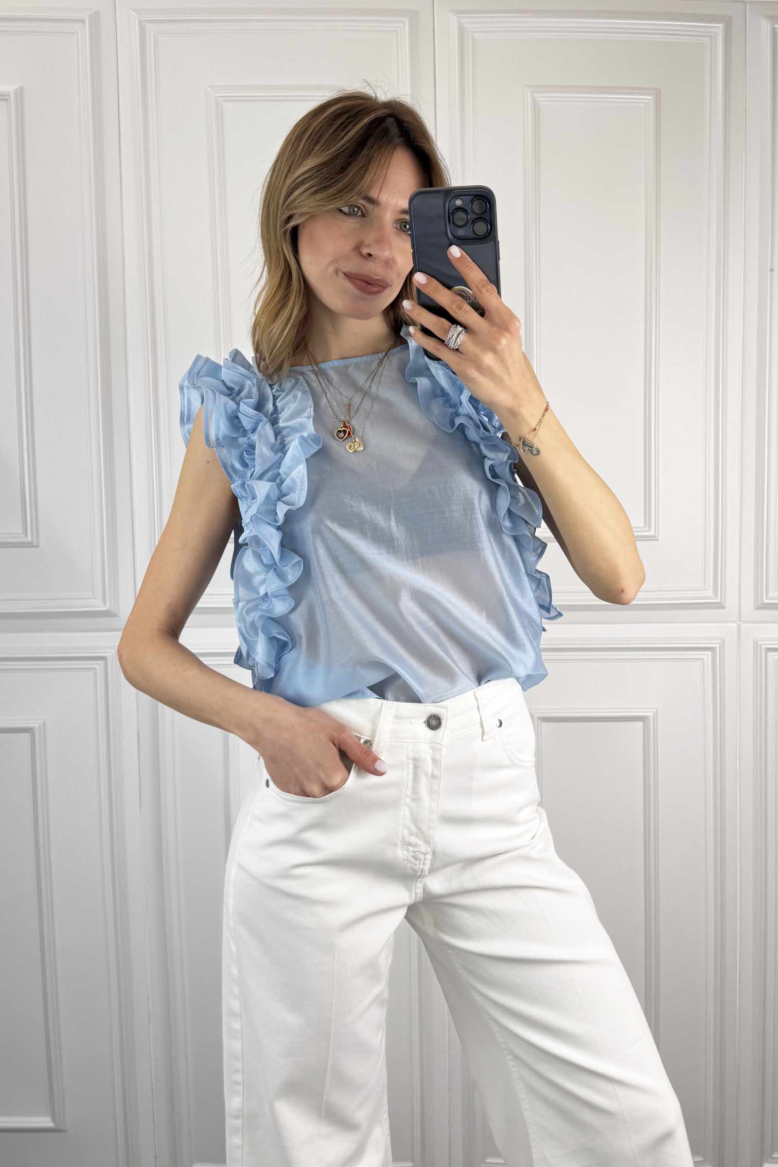 Blusa smanicata con rouges