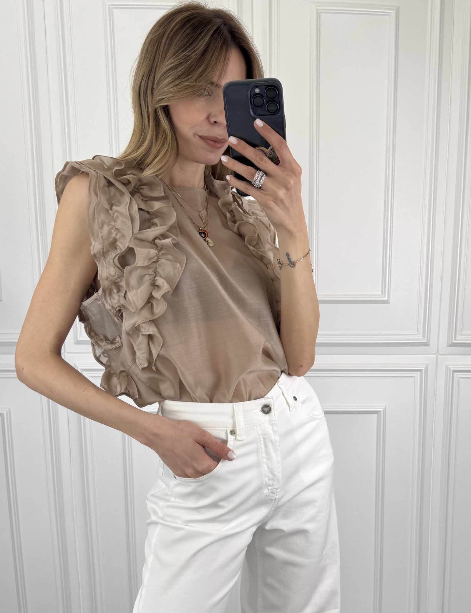 Blusa smanicata con rouges