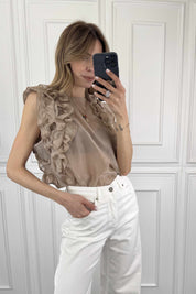 Blusa smanicata con rouges