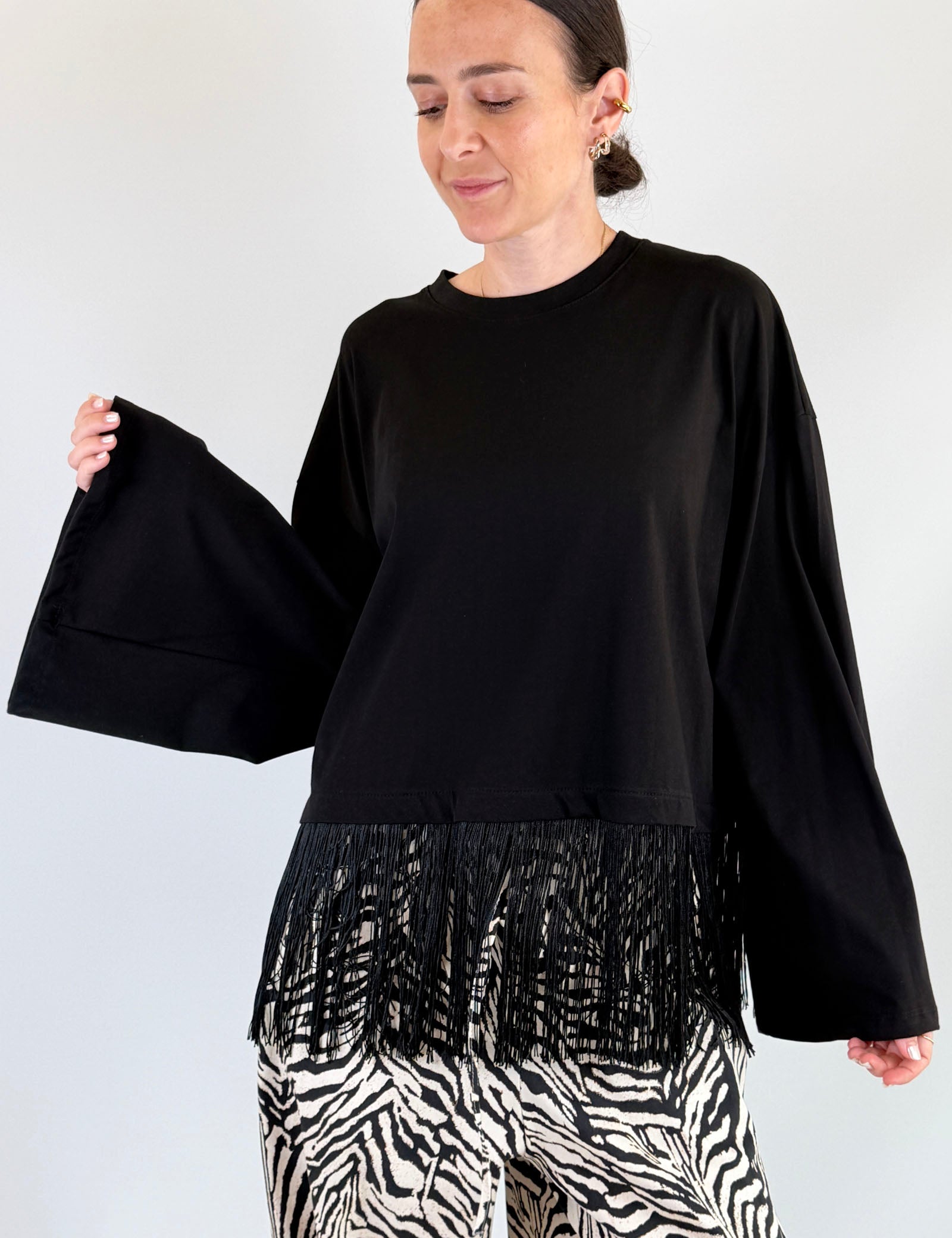T-shirt manica ampia e frange