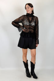 Short con pieghe