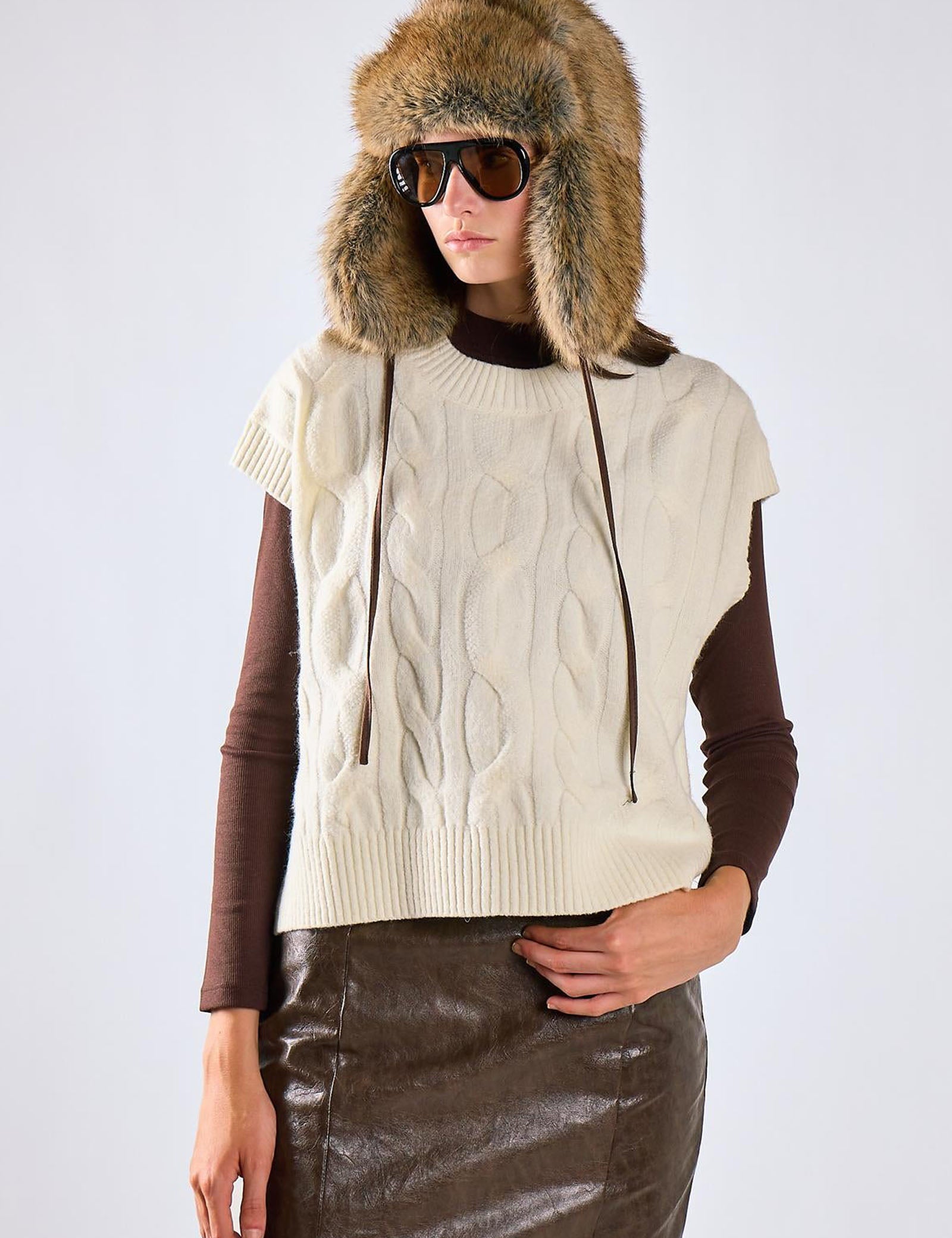 Gilet trecce girocollo