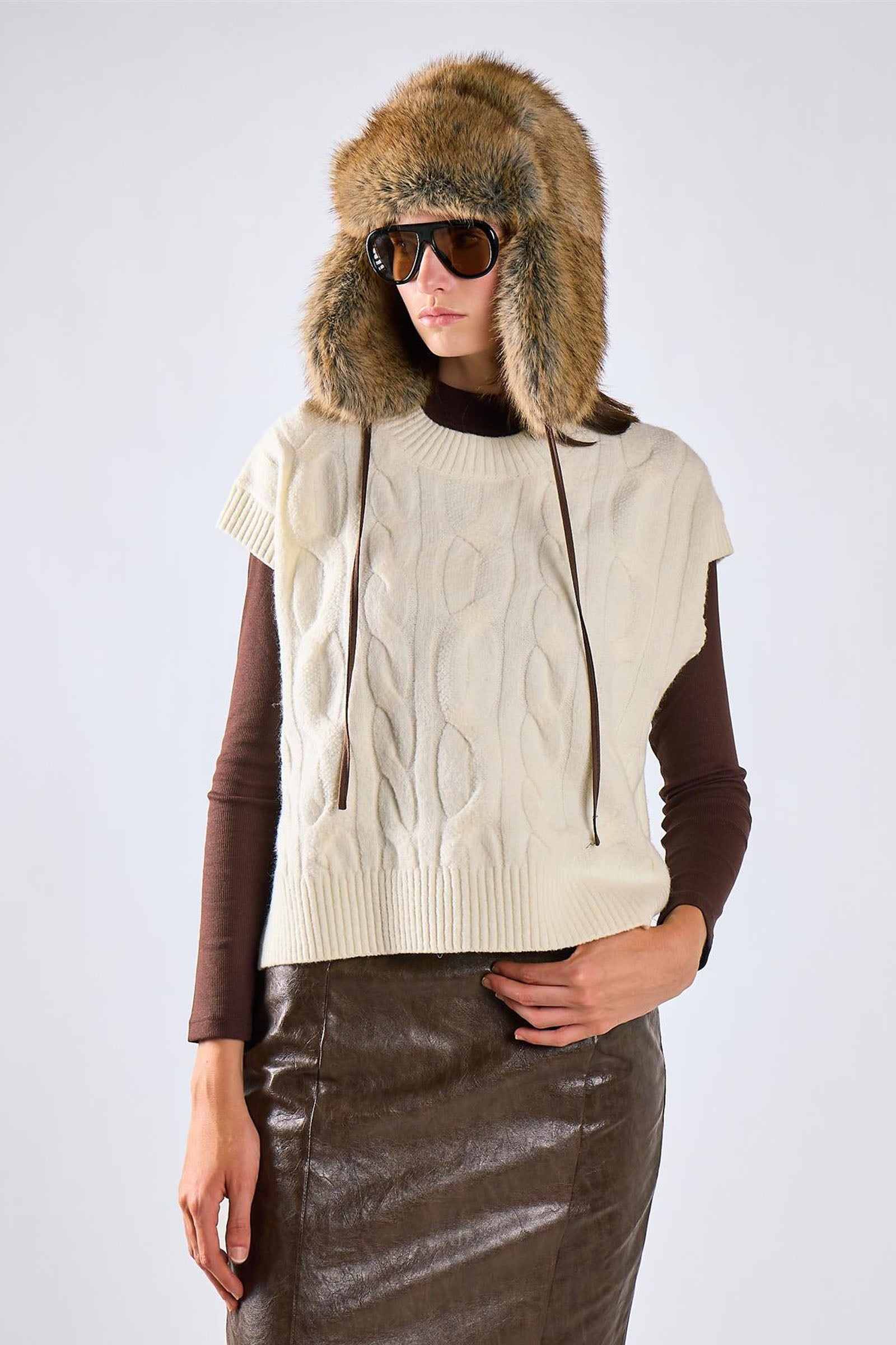 Gilet trecce girocollo