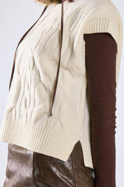 Gilet trecce girocollo