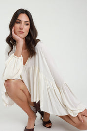 Blusa con balza scollo a V