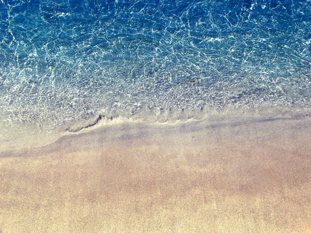depositphotos_288913560-stock-photo-water-texture-sand-beach-summer.jpg