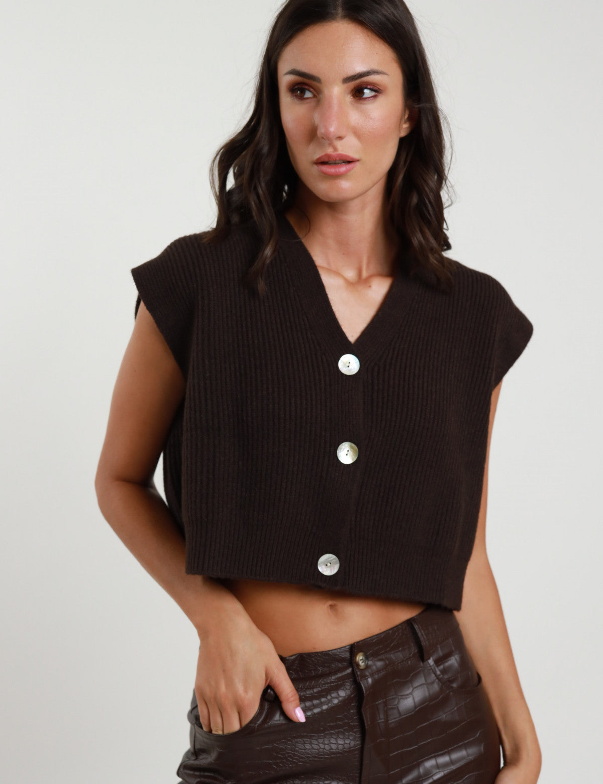 Gilet coste e bottoni