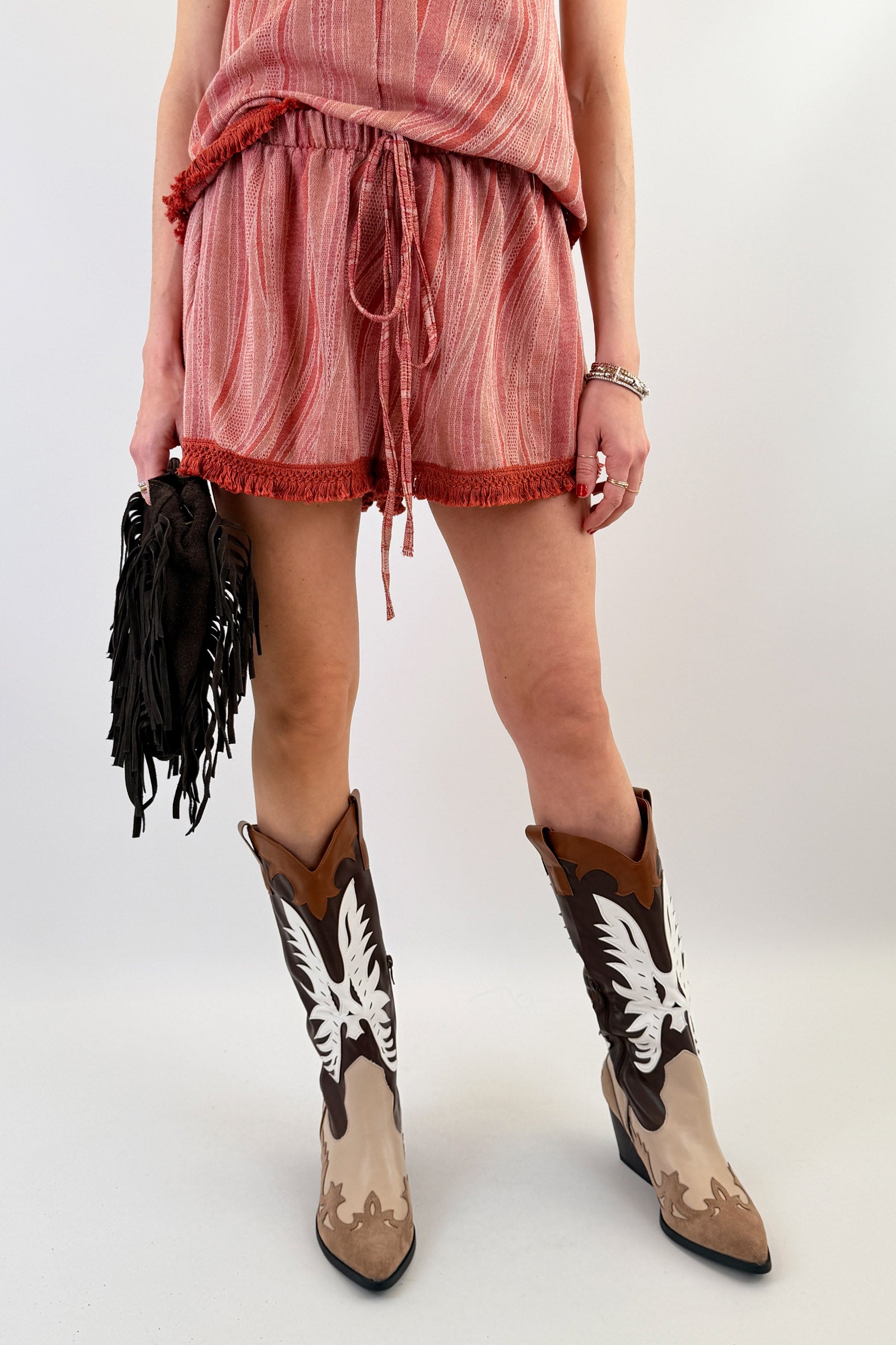 Shorts con passamaneria