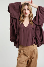 Blusa con balza scollo a V
