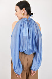 Blusa cut out spalle