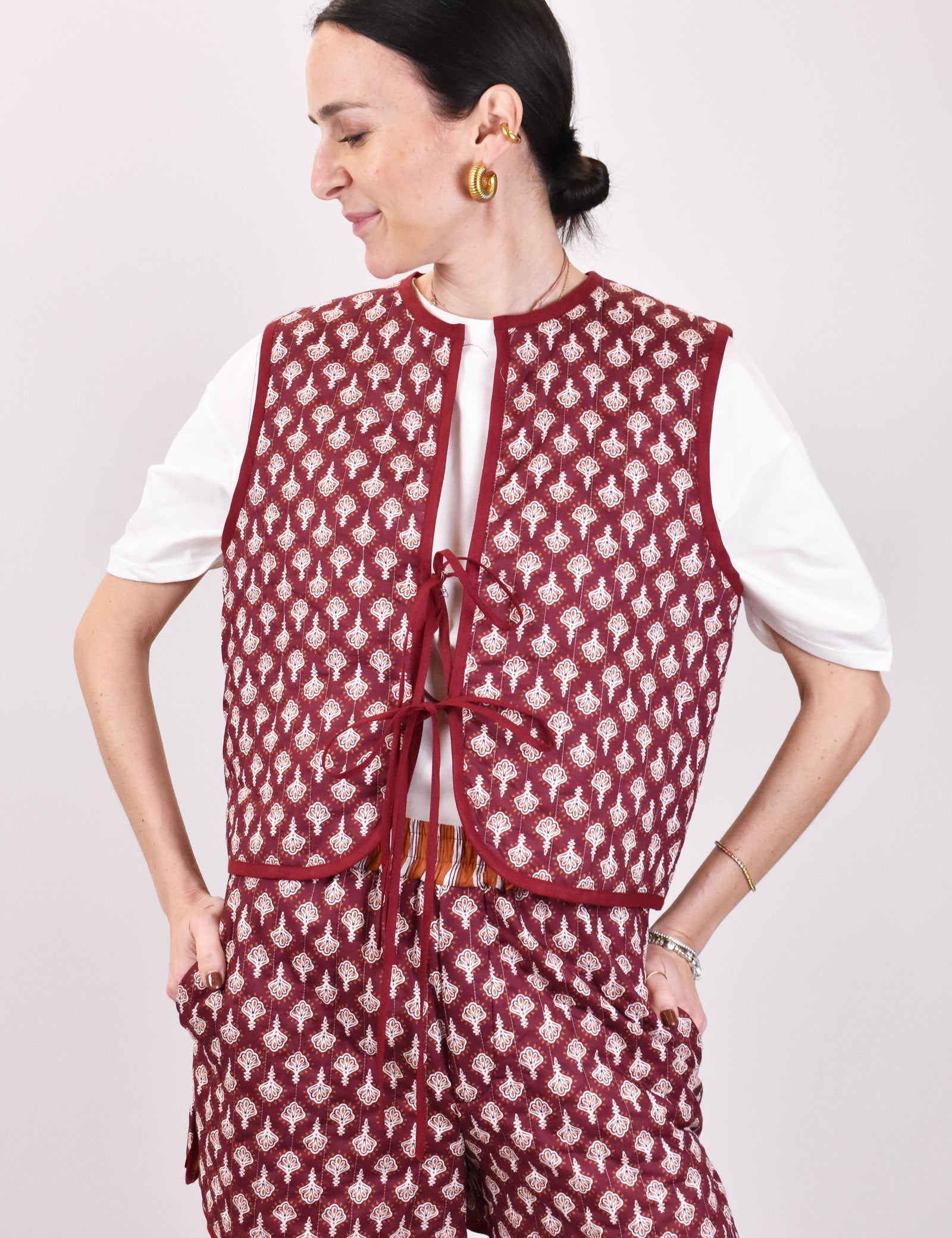 vicolo-gilet-trapuntato-rosso-arancione.jpg